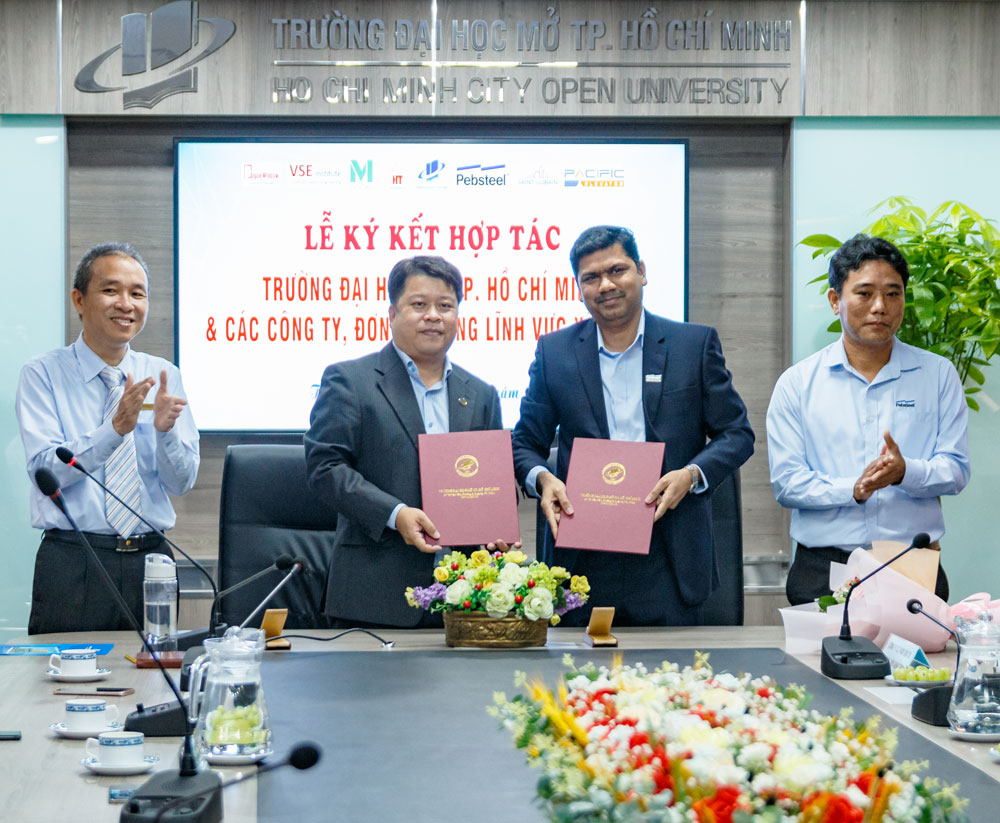 Signing Ceremony Between Pebsteel And HCMC Open University